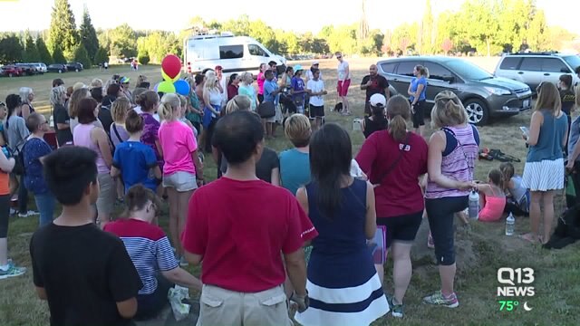 Redmond residents turn out in support of woman attacked on trail