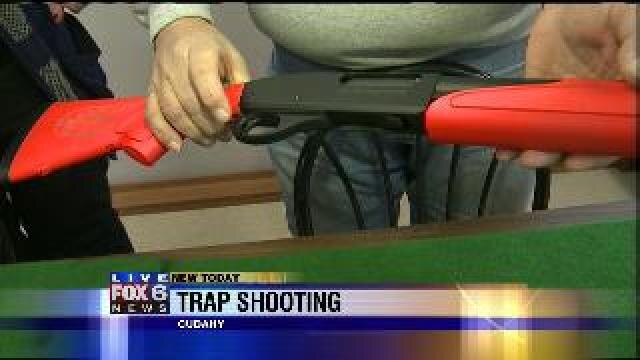 Laura earns about trap shooting