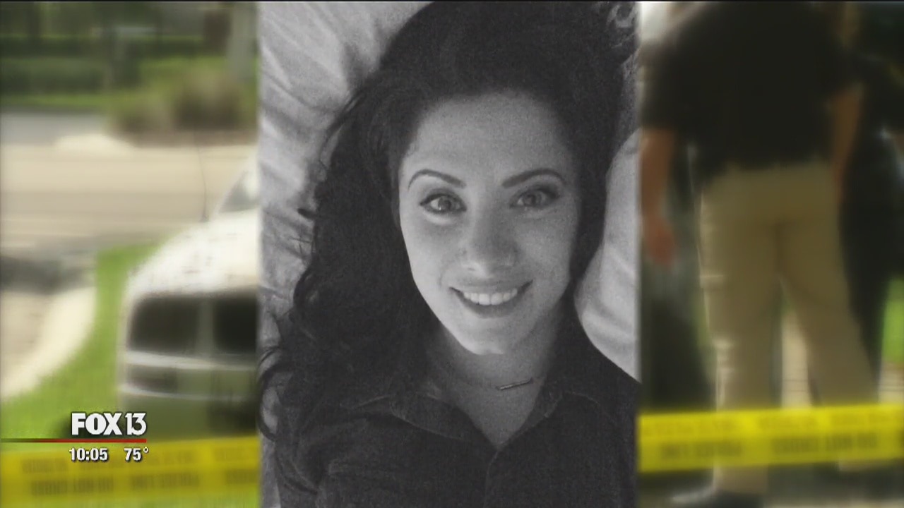 Woman rescued from sinking car