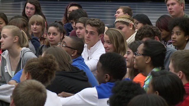 Students challenged "to make our world better, to make our community better"