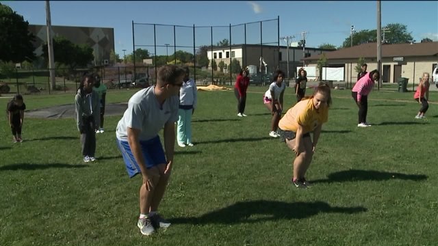 Chip learns a jump sequence with the cheerleaders