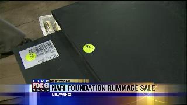 Laura checks out counter tops at NARI Foundation Rummage Sale