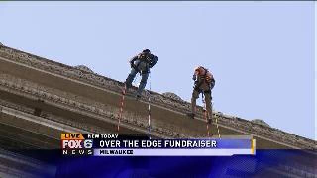 Laura steps over the edge