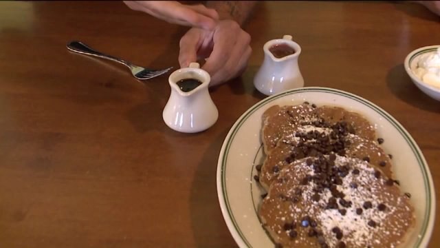 Carl enjoys pancakes at The Original Pancake House