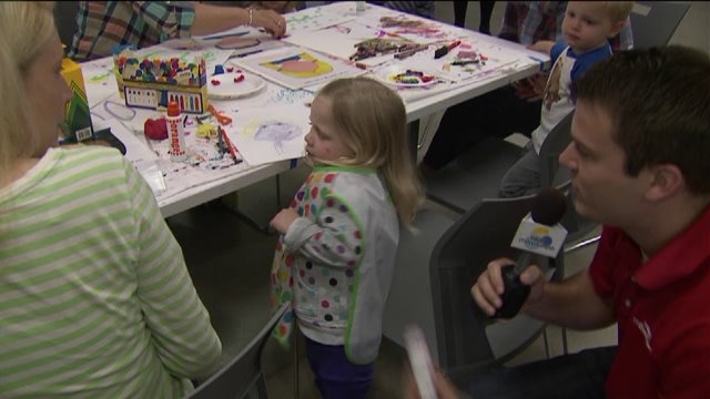 Chip learns about different hands-on activities taking place