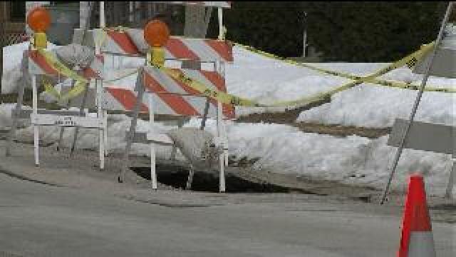 Did hole in road damage a car?