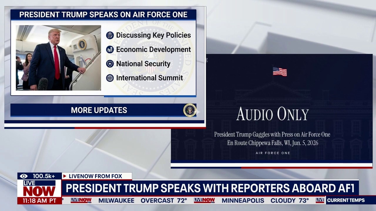 President Trump speaks with reporters aboard AF1