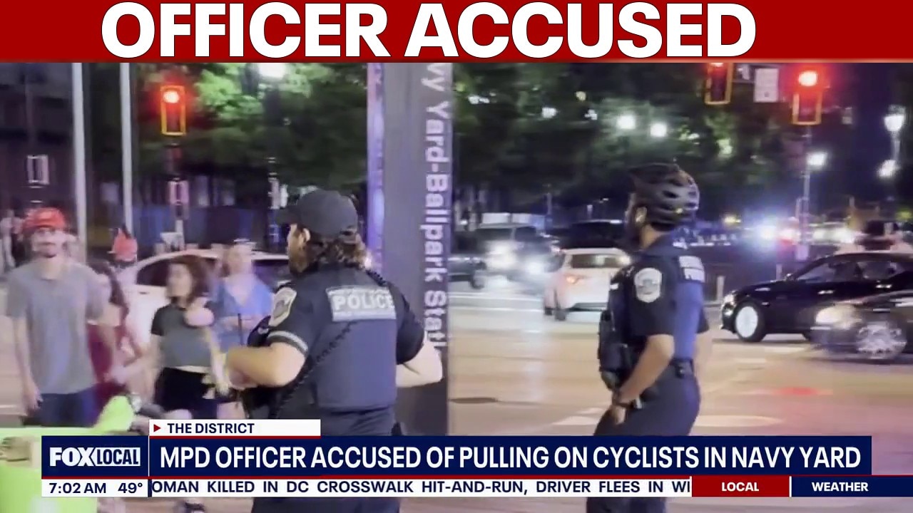 Video of officer accused of pulling girls off bike