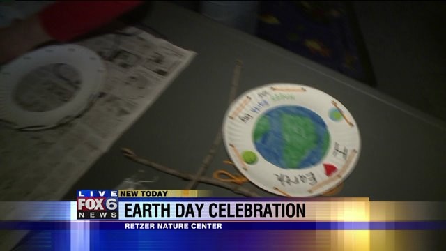 Laura enjoys making crafts as she celebrates Earth Day