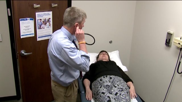 Slowly losing his hearing, he thought he`d lose his job as a doctor; how he risked it all to get it back