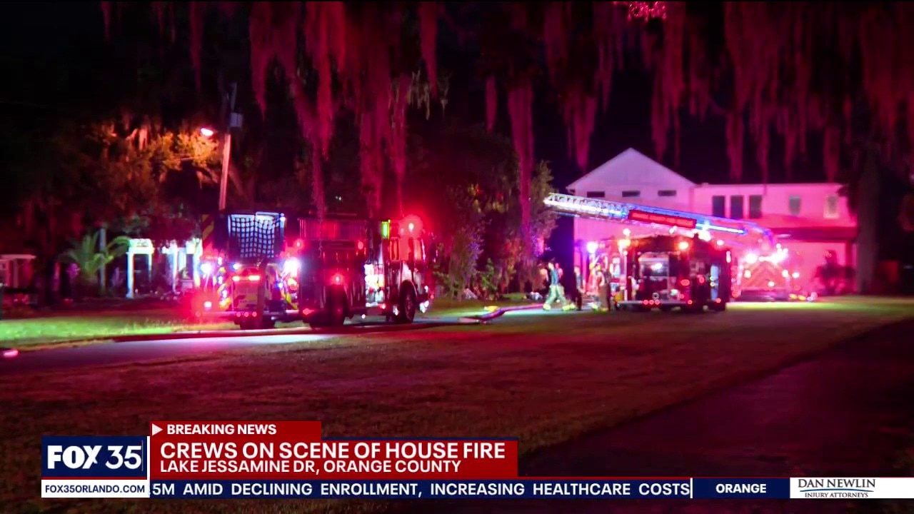 Crews battle house fire in Orange County