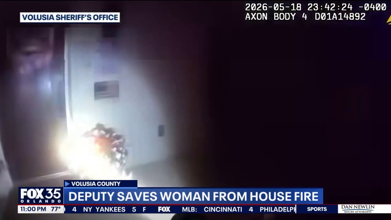 Volusia deputy saves elderly couple from burning home