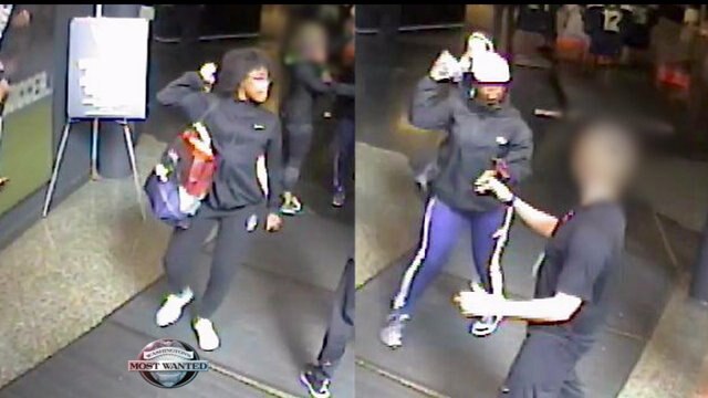Niketown robbers caught on camera threatening employees with metal shoe measuring device