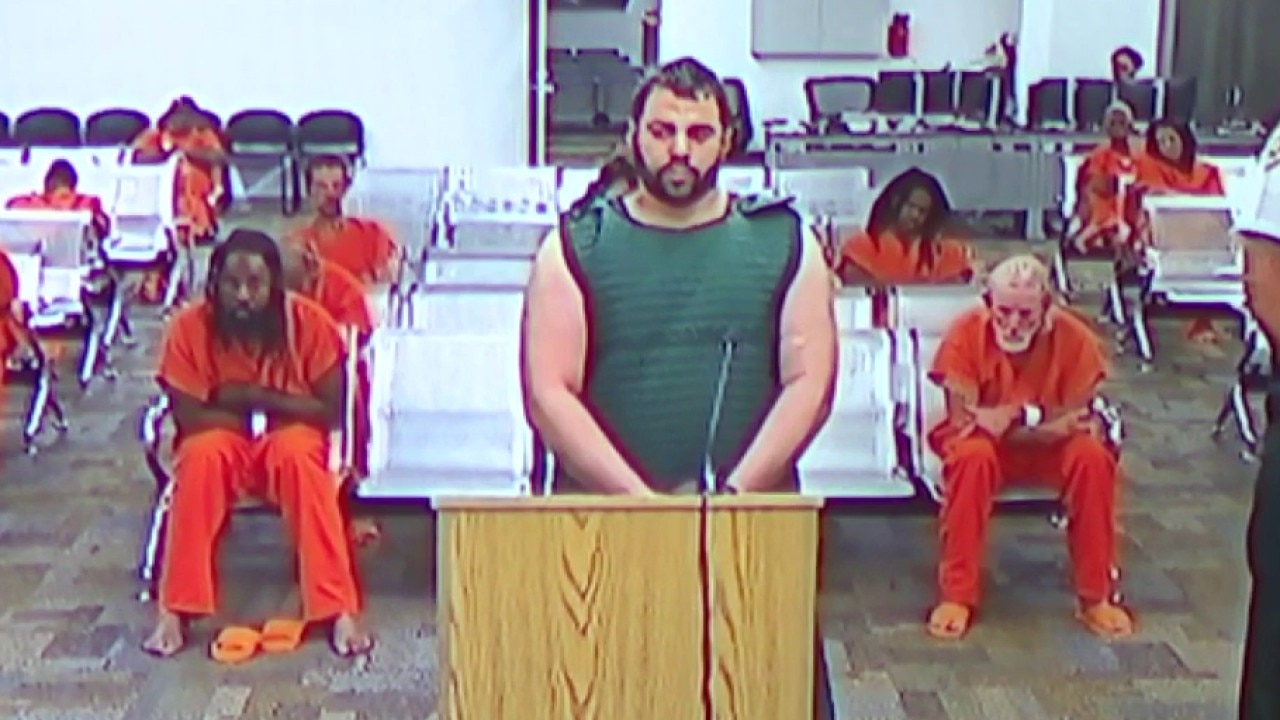 Roommate charged with killing 2 missing USF students; one found dead, search continues for second