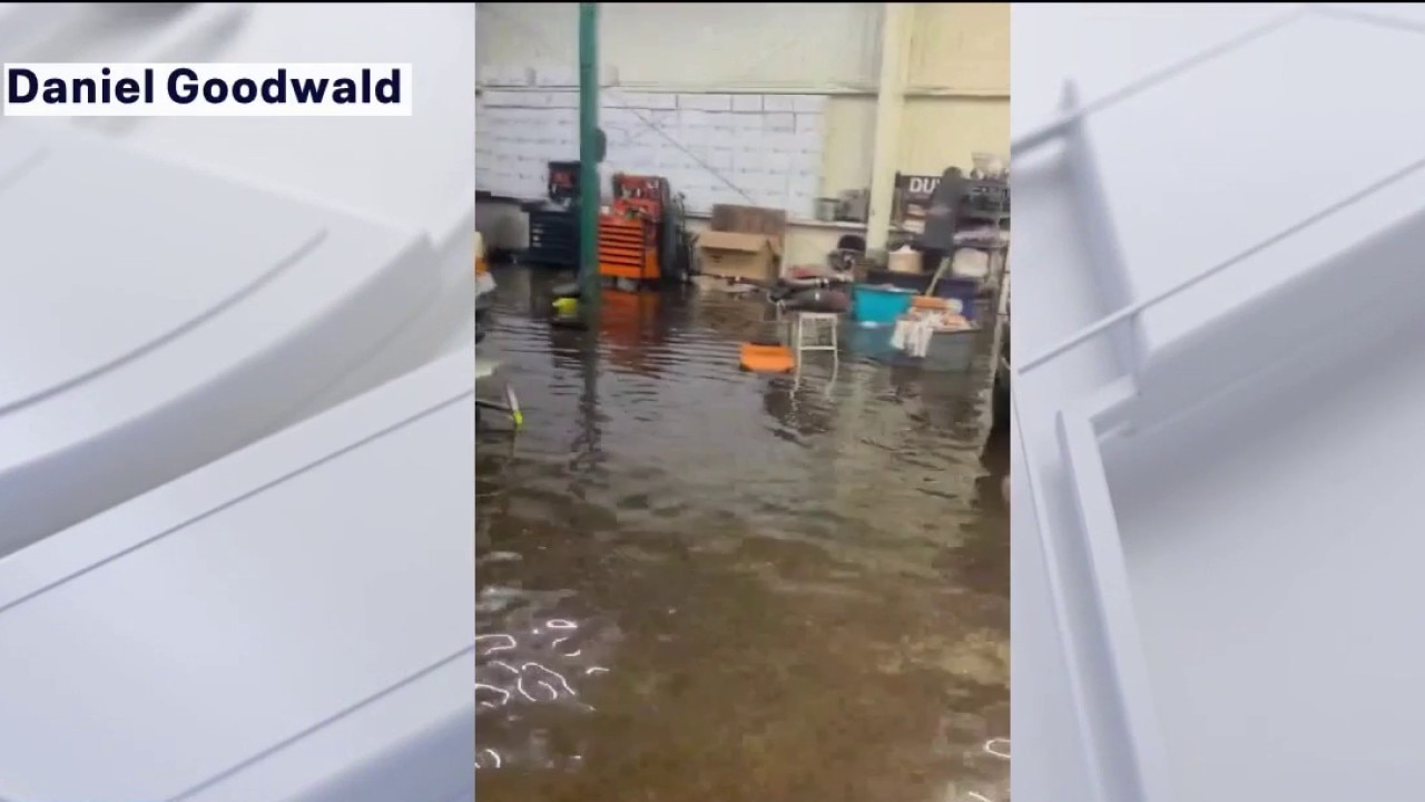 Auto repair shop floods during summer storm