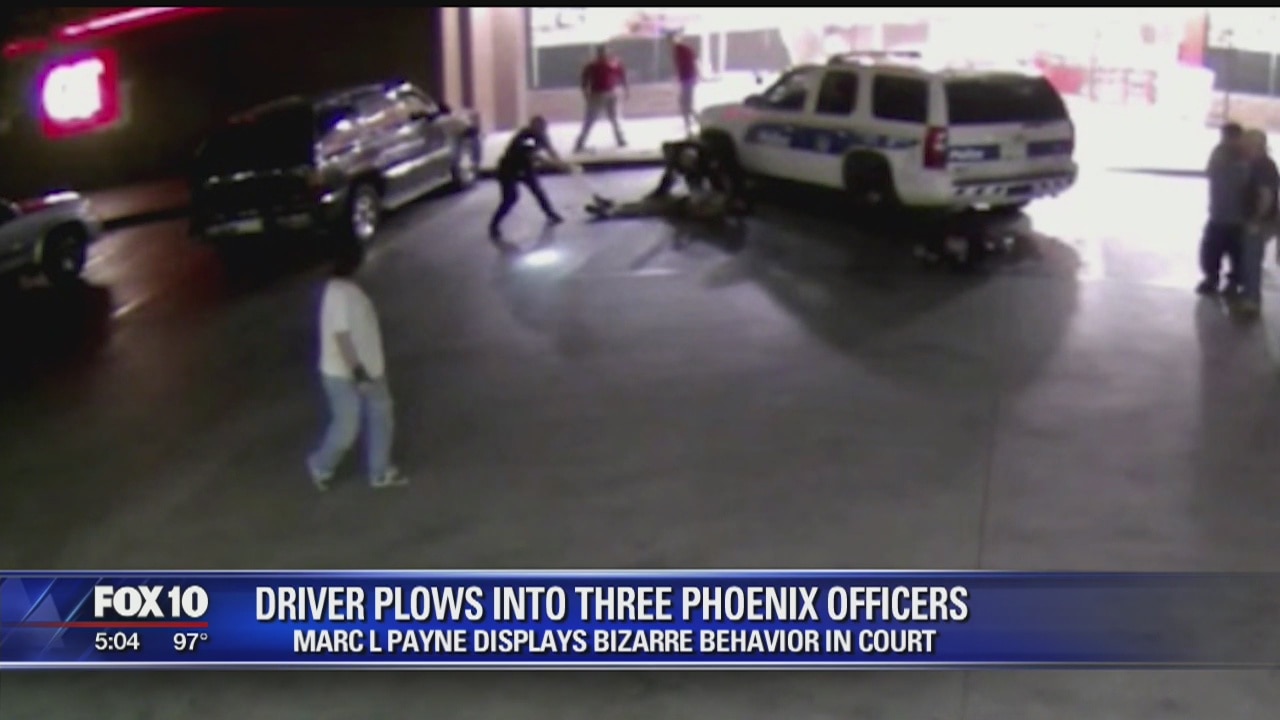 Man held without bond after running over Phoenix police