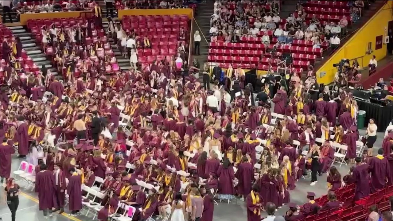 Graduating ASU students deal with hot temps