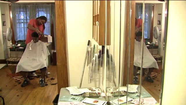 Self-proclaimed `boy from the streets,` barber mentors inner-city youth: "They need somebody"