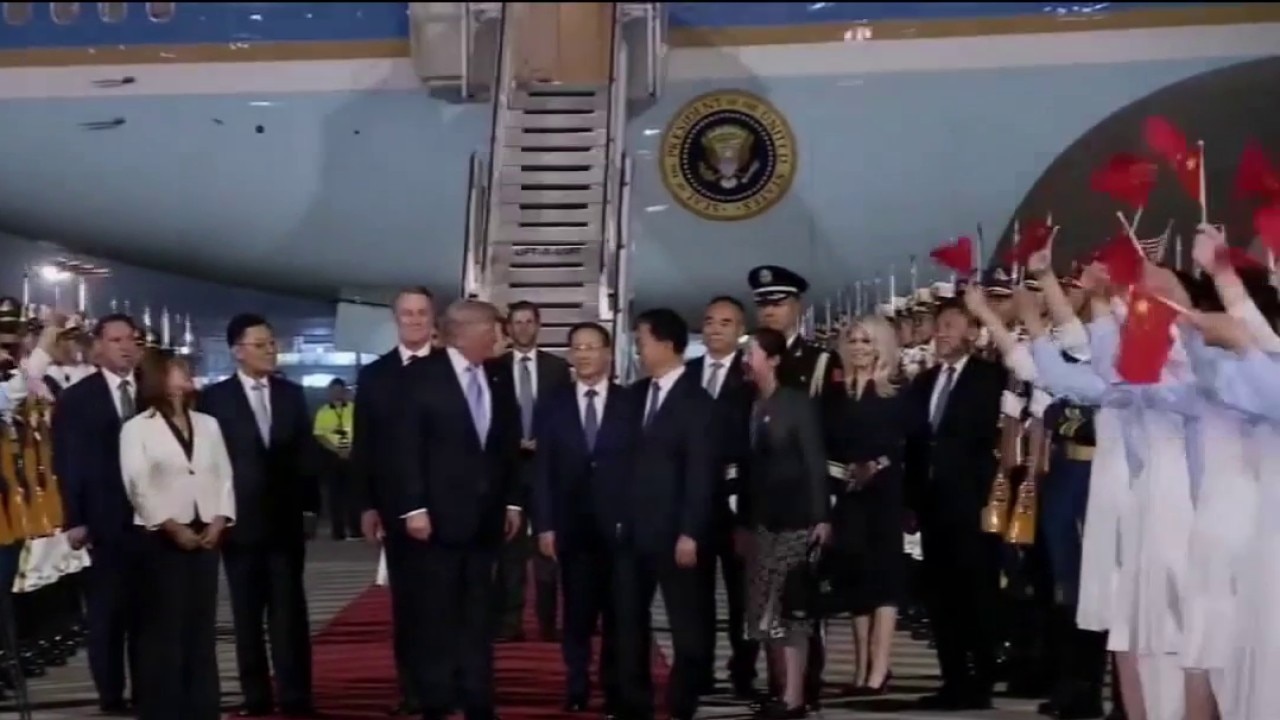 Trump arrives in China for trade summit 