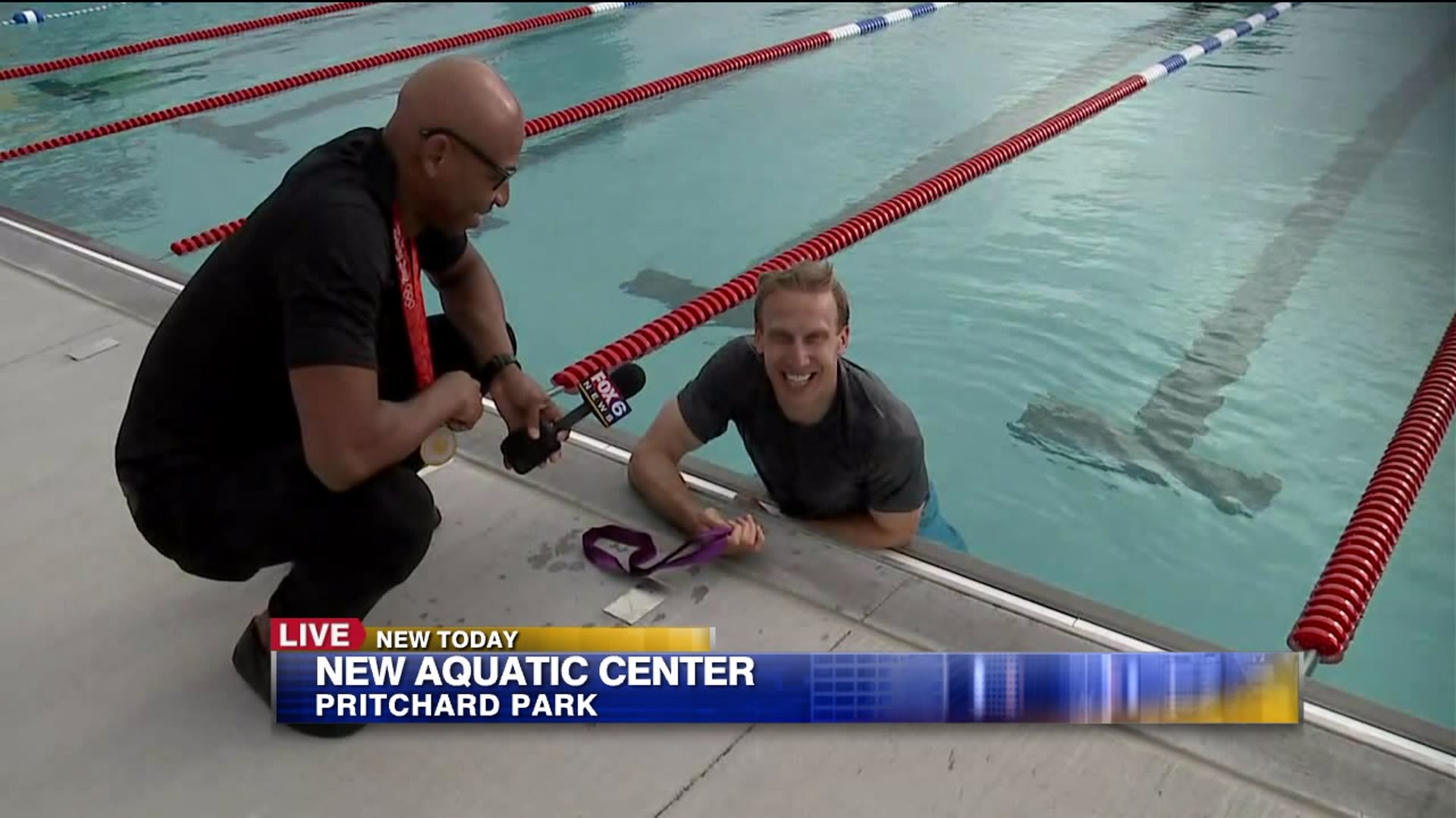 Carl talks with an Olympic gold medalist