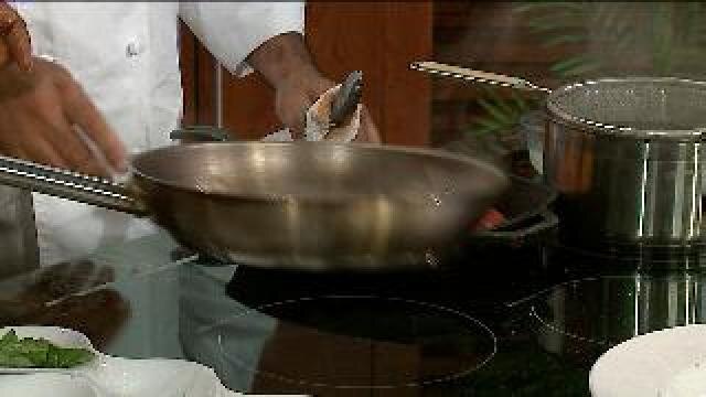 Chef Feker prepares penne pasta tossed with grilled Roma tomatoes