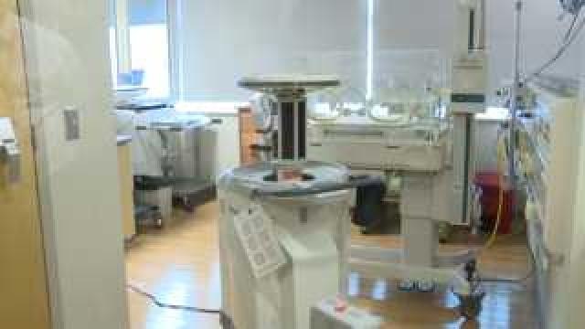 Germ-zapping robots put to work