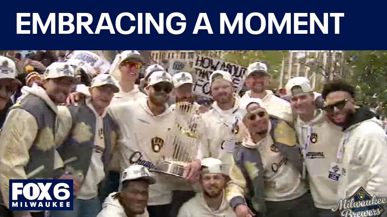 Brewers join fans on street at celebration parade