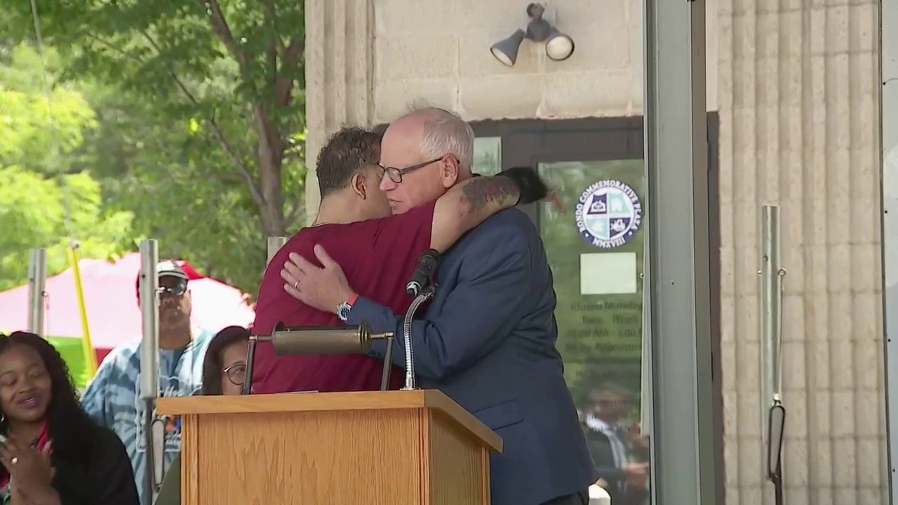 Walz receives medal of honor at Rondo Juneteenth event