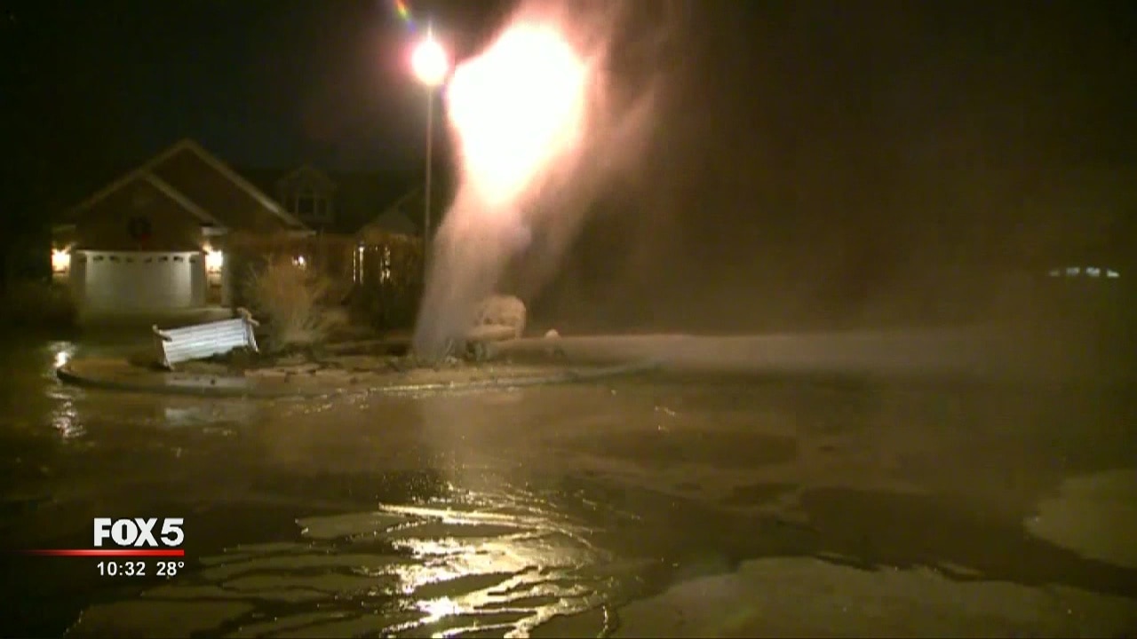 Broken water main coats neighborhood in ice