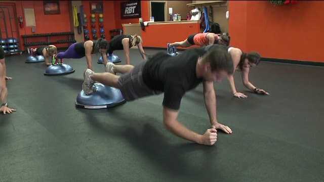 Chip learns how to get in a good workout with a Bosu Ball