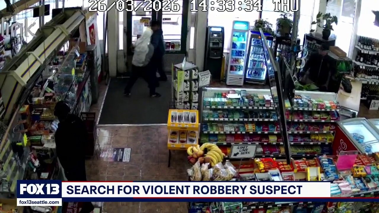 Surveillance video show violent assault during Seattle robbery
