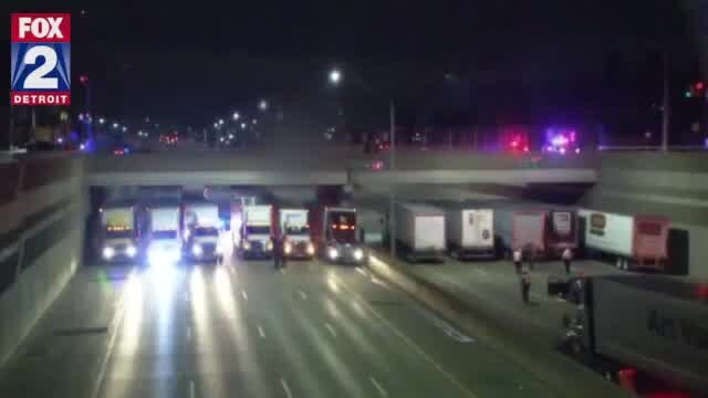 13 semi trucks a Michigan interstate for a man considering suicide