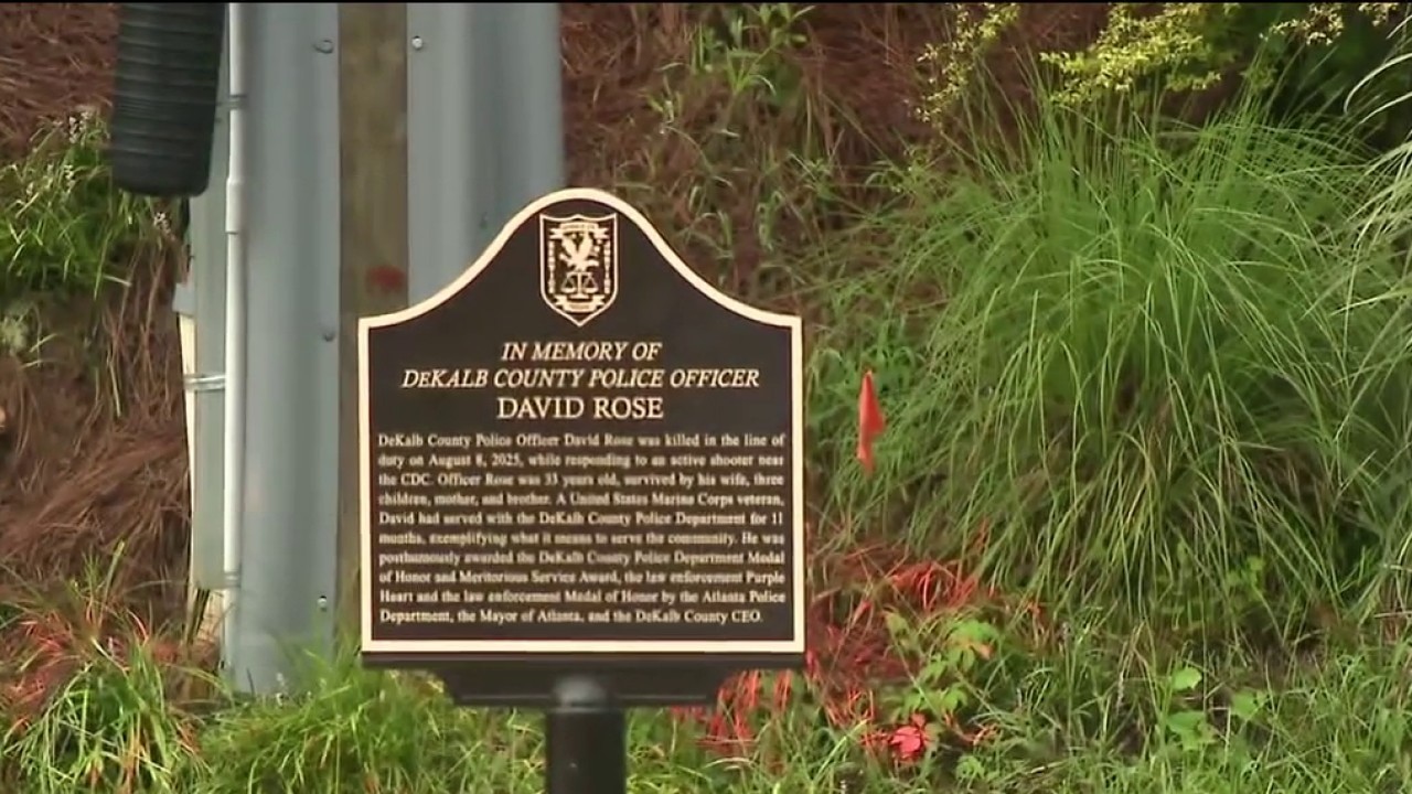 Plaque and road honor fallen officer David Rose