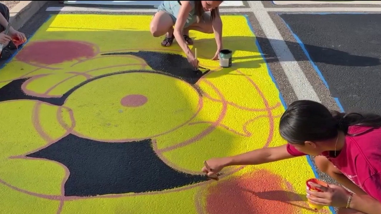 Mesquite High students customize parking spaces with nostalgic art