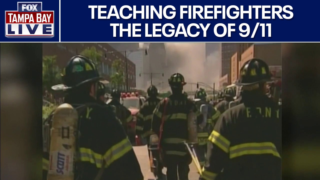 Fire chief teaching young firefighters 9/11 history
