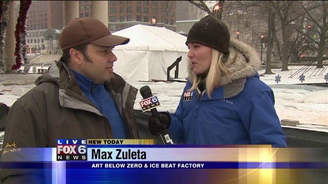 Laura learns about different entertainment acts at Holiday Lights Festival