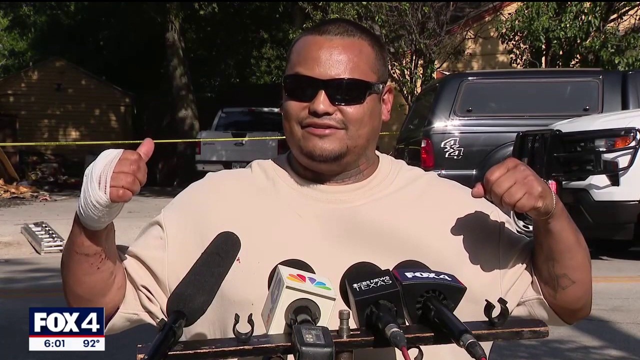 Man runs into burning home to rescue 2 children
