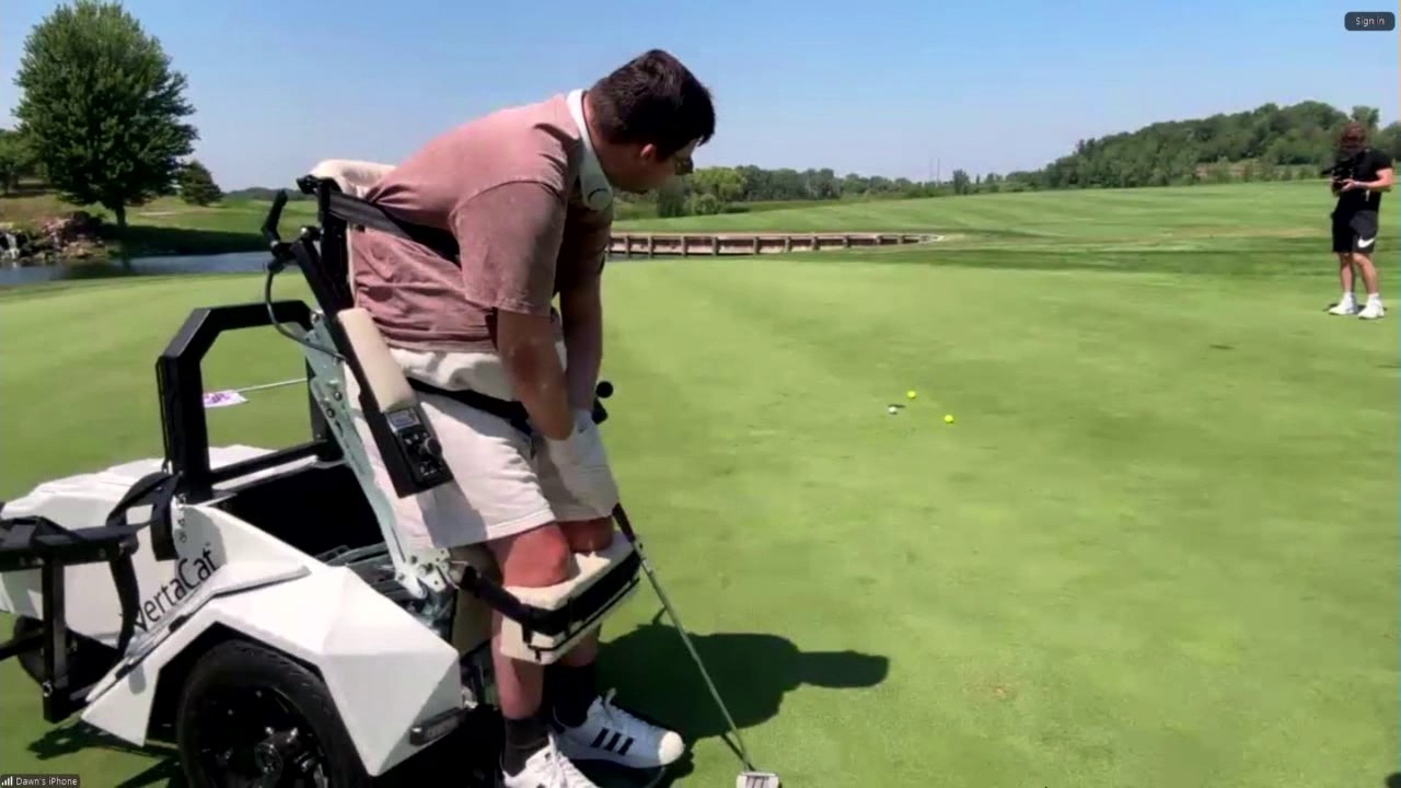 Jack Jablonski sinks putt during All Day interview at charity golf event