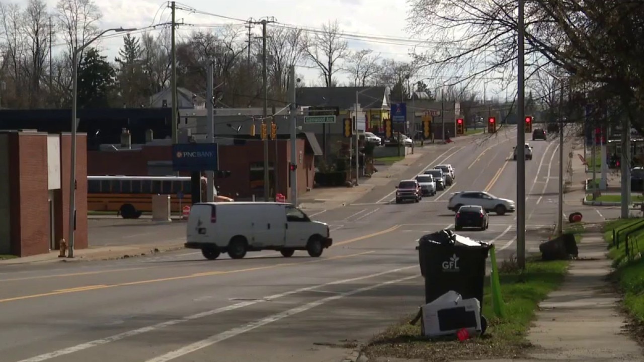 Woman accused of shooting at vehicle in ongoing dispute