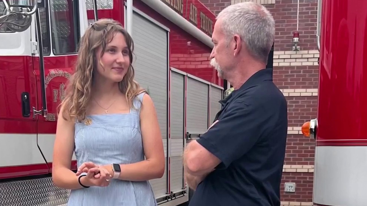 Firefighter cheers on AZ grad after delivering her
