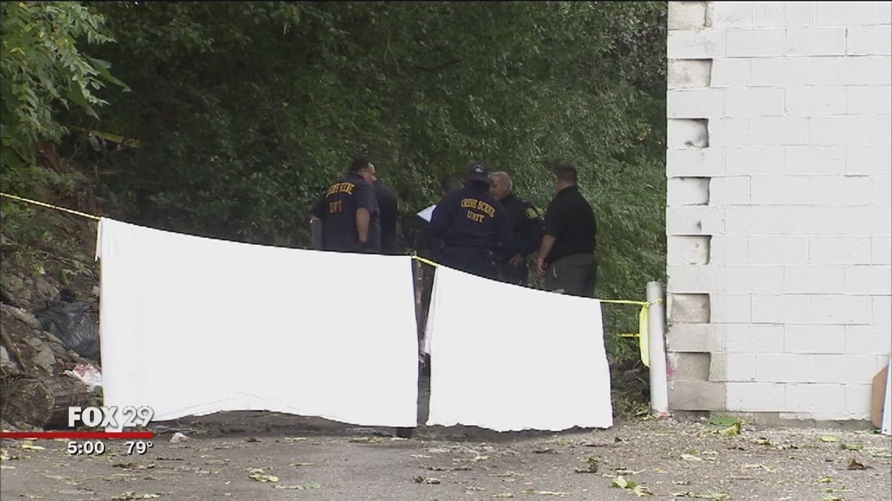 Man's burned body found near railroad tracks in Kensington
