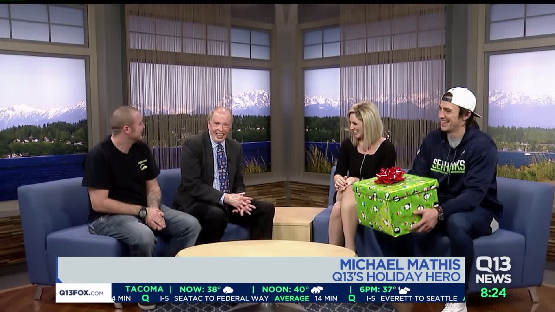 Luke Willson helps honor Q13 FOX`s holiday hero