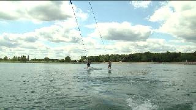 Courtney King tries out wakeboarding