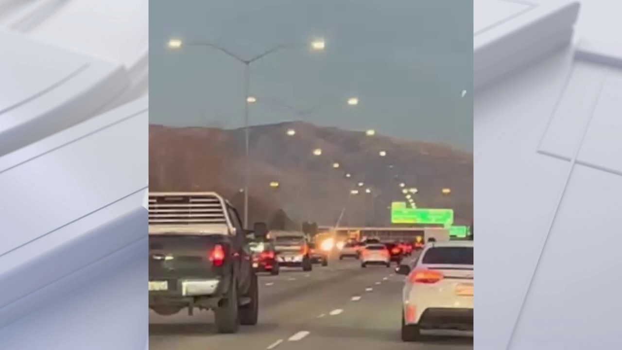 Motorcyclist wipes out popping a wheelie