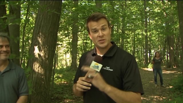 Chip enjoys a trail walk as he learns about the August Gift to the Community