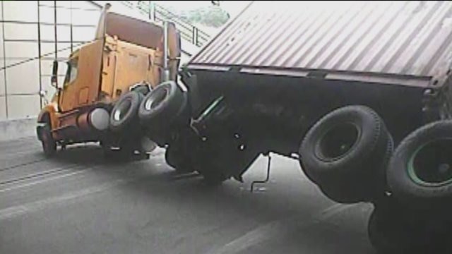 Semi overturns in Mitchell Interchange tunnel