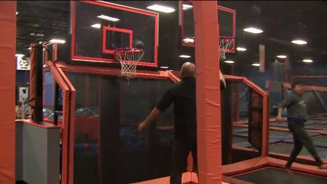 Kramp plays basketball at Sky Zone Trampoline Park