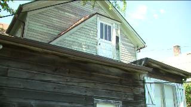 Woman pushed from porch in Sheboygan
