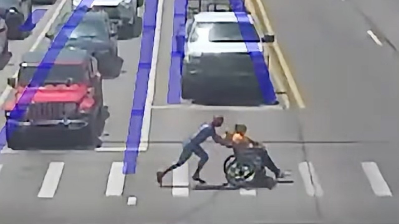 Spider-Man saves man in wheelchair