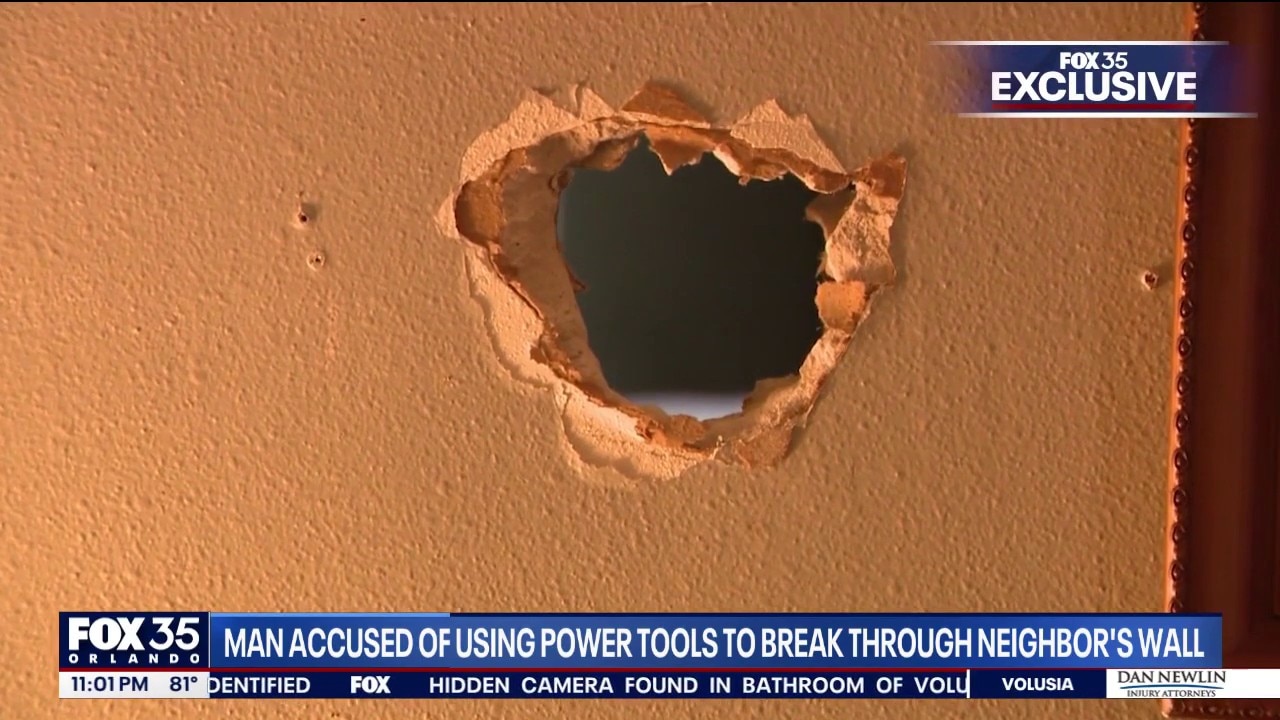 Man Accused using tools to break through shared wall: Neighbor